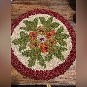 Handcrafted 15” Round Woolen Chair Pad - Green, Red, and Cream. Measures 15”x15”